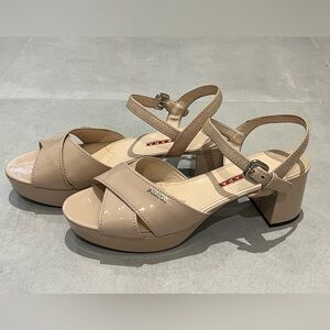 Prada nude patent platform heel logo sandal. Size EU 40 (fits like a US9-9.5).